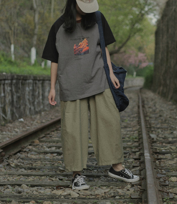 イルムドローム ラグランプリントTシャツ